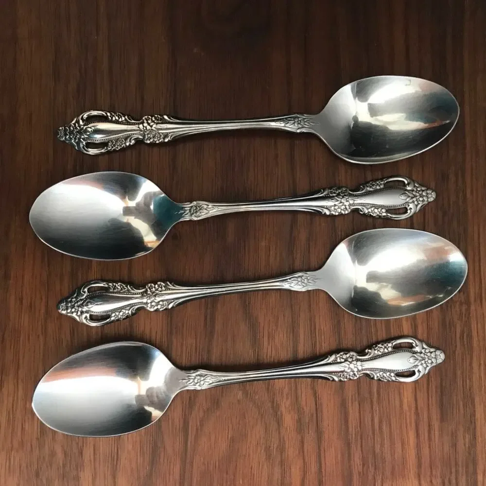 Oneida RAPHAEL stainless glossy flatware - set of 4 oval place spoons
